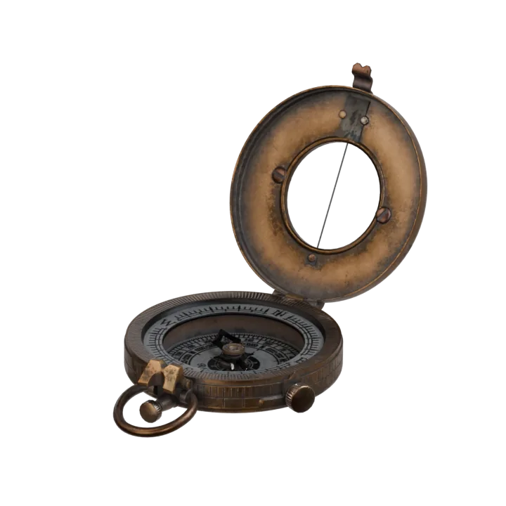 An open brass compass.